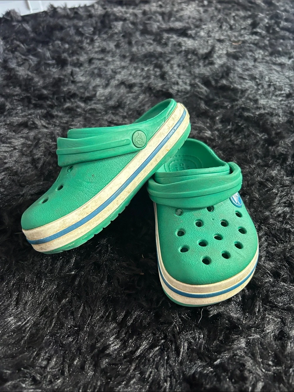 CROCS Kids Green Clogs with Blue & White Midsole Stripe